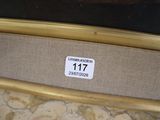 a picture of a close up of a bed with a name tag on it