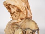 a statue of a man with a hood on his head