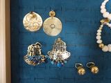 a picture of a display case with jewelry on it