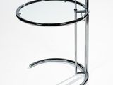 chrome and glass side table with curved legs and a glass top