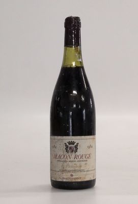 a bottle of wine that is sitting on a table