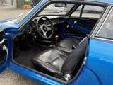 an image of a blue car with the door open