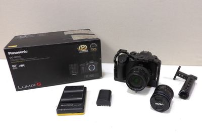 panasonic lumix g2 digital slr camera with lens, battery, and accessories