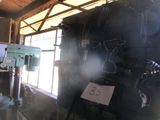 a picture of a machine shop with a lot of tools