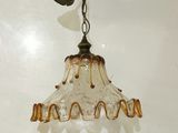 a light that is hanging from the ceiling in the room