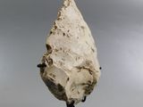 an image of a piece of stone on a stand