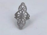 a white gold ring with diamonds on a white background