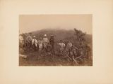 an old photo of a group of men working in a field