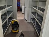 a vacuum that is on the floor in a room