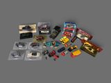 a lot of toy cars that are sitting on a table