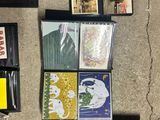 a lot of cds and other items on the floor