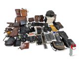 a lot of different types of leather items on the ground