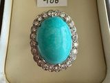 an image of a ring in a box with a price tag on it