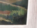 une photo d'un tableau représentant un paysage, dans un cadre