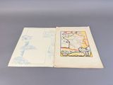 an open book with a map on it sitting on a table