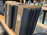 a lot of books on a shelf in a store