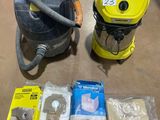 two vacuums that are sitting on the floor next to each other