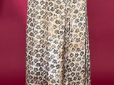 a woman ' s leopard print skirt on a mannequin mannequin mannequin mannequin mannequin mannequin mannequin manne