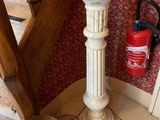 a fire extinguisor on the floor next to the stairs