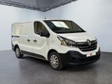 the white van is parked in a large room with white walls