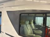 an image of a passenger bus with its doors open