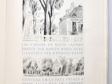 an open book with a drawing of a house and trees on it