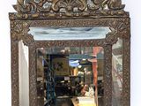 a mirror that is sitting on the wall in the room