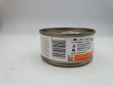 a can of canned food sitting on a table