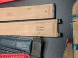 several pieces of leather are laid out on a table