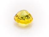 a yellow diamond on a white background