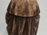 an image of a statue of a man with a hat on his head