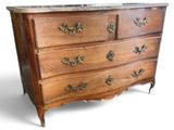 a wooden dresser with marble top on a white background