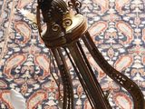 a lamp that is sitting on the floor next to a rug