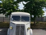 a white truck that is parked in a parking lot