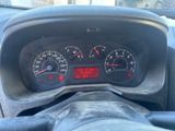 a close up of a car dashboard with a speedometer and gauges