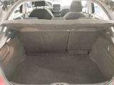 the back of a car with the trunk open and the seats down