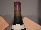 a bottle of wine that is sitting on a table