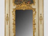 a mirror with a painting on it on the wall