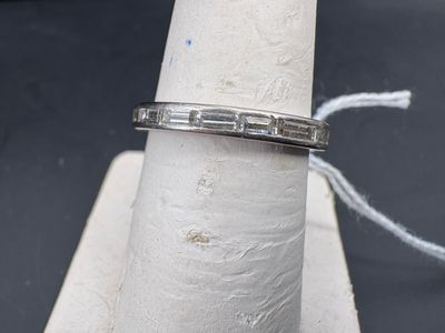 an image of a wedding ring on a ring stand