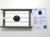 an image of a blue sapphire in a white box with a card