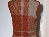 an orange and grey vest on a mannequin mannequin mannequin mannequin mannequin mannequin mannequin mannequin mann