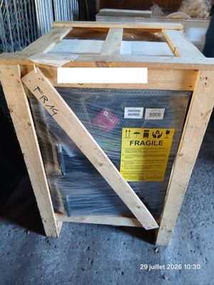 a wooden box that has a lot of boxes inside of it