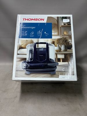 gros plan d'une boîte d'aspirateur sur une table
