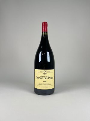 a close up of a bottle of wine on a table