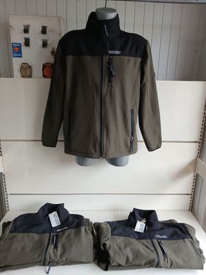 two jackets on display in a store with a mannequin