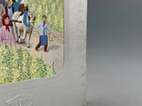 une photo d'un livre sur laquelle figurent un homme et une femme à cheval