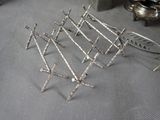 a bunch of nails that are laying on a table
