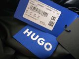 the tag is attached to the back of a jacket with a tag attached to it
