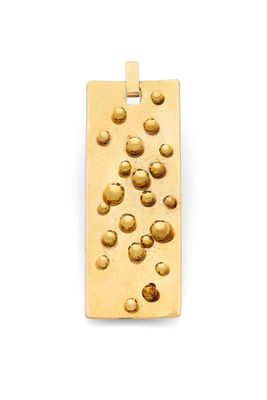 an image of a gold plated pendant with small bubbles on it