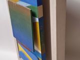 a picture of a picture of a bookshelf with books in it